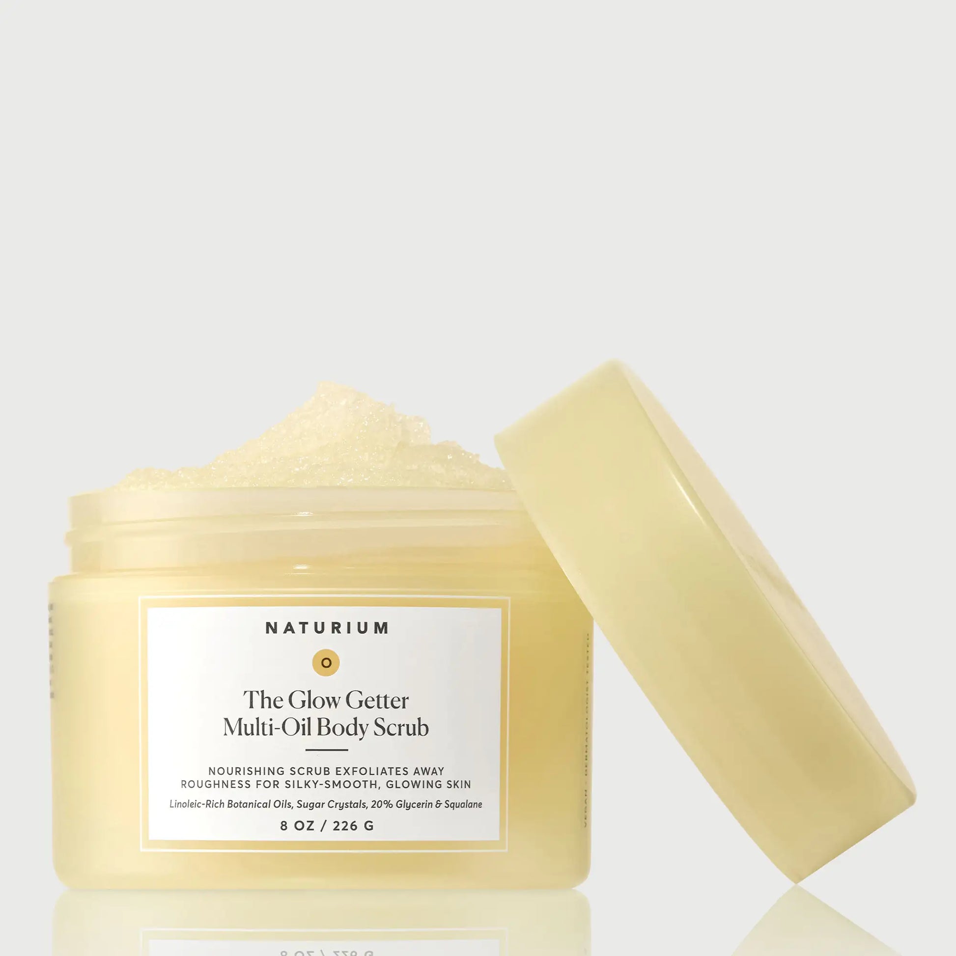 the-glow-getter-multi-oil-body-scrub-v8 NATR-40028-GlowGetter-Multi-Oil-Body-Scrub-Front-CapOff-bonebkgd.webp